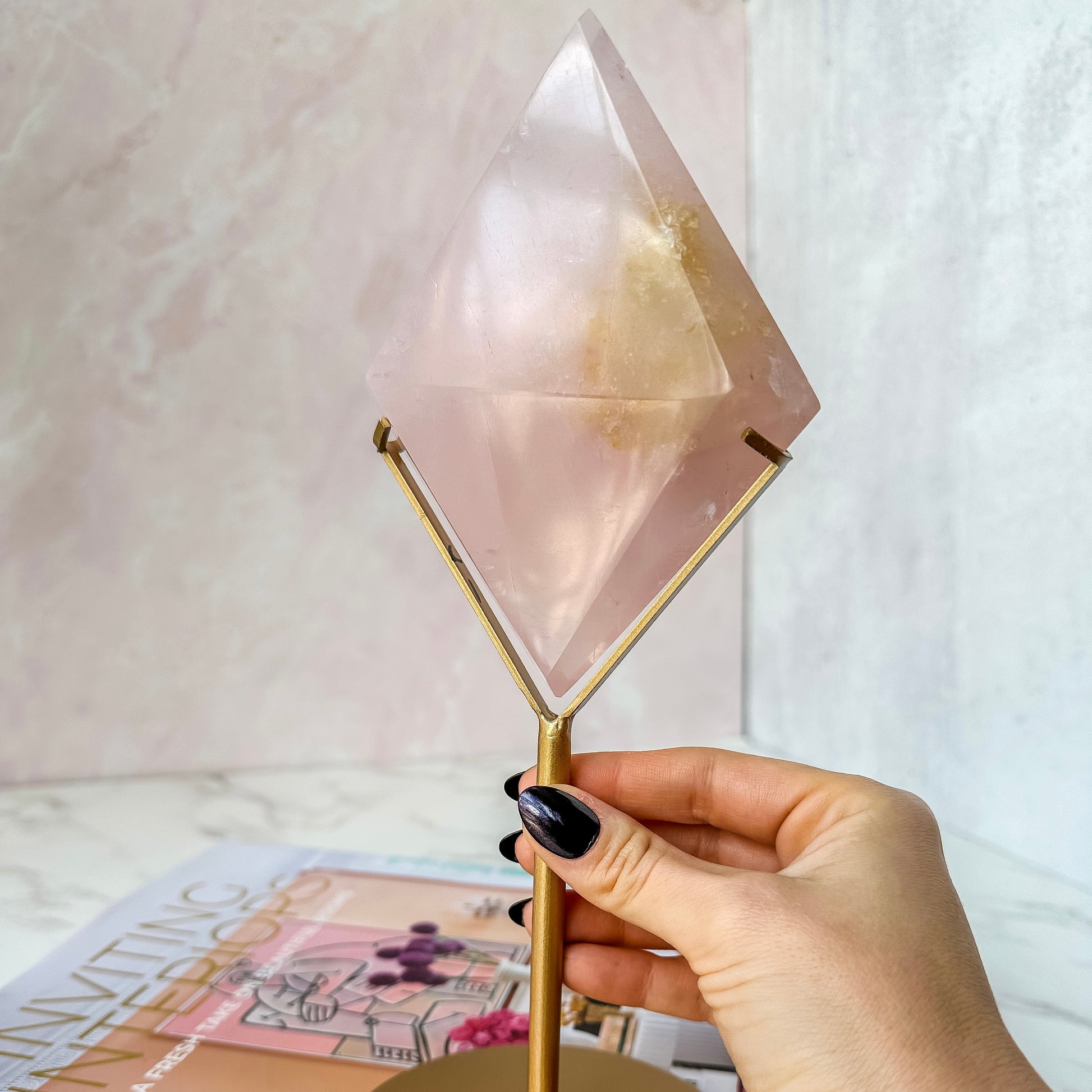 Rose Quartz Diamond on a Gold Stand